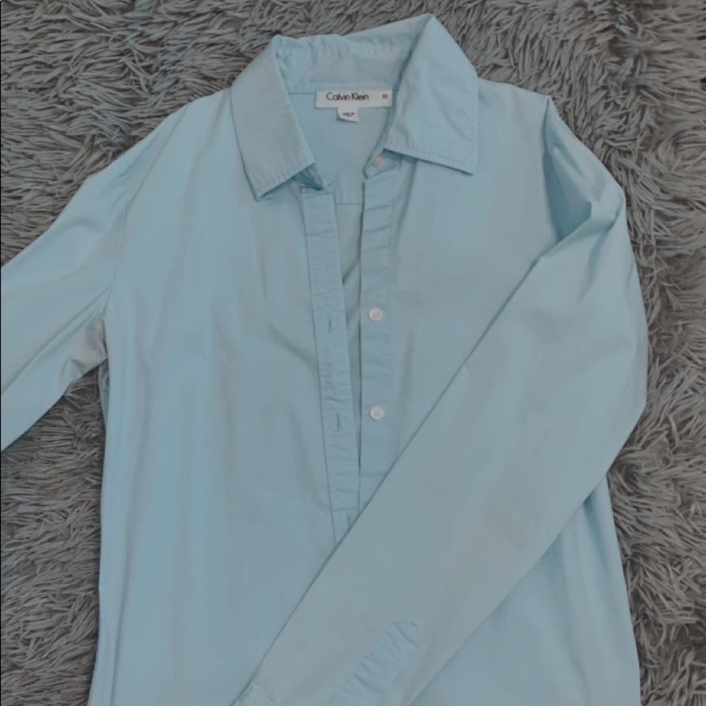 Calvin Klein XS button up long sleve polo blue